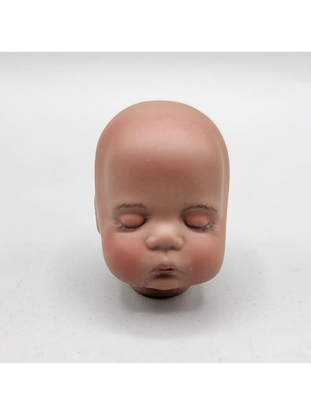 Sugar Lump Porcelain Bisque Dark Brown Doll Head Repro Painted Face Closed Eyes